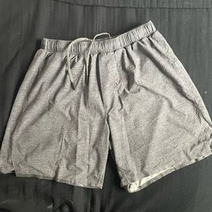 Men’s Lululemon drawstring athletic gray short with liner, 6” inseam size medium
